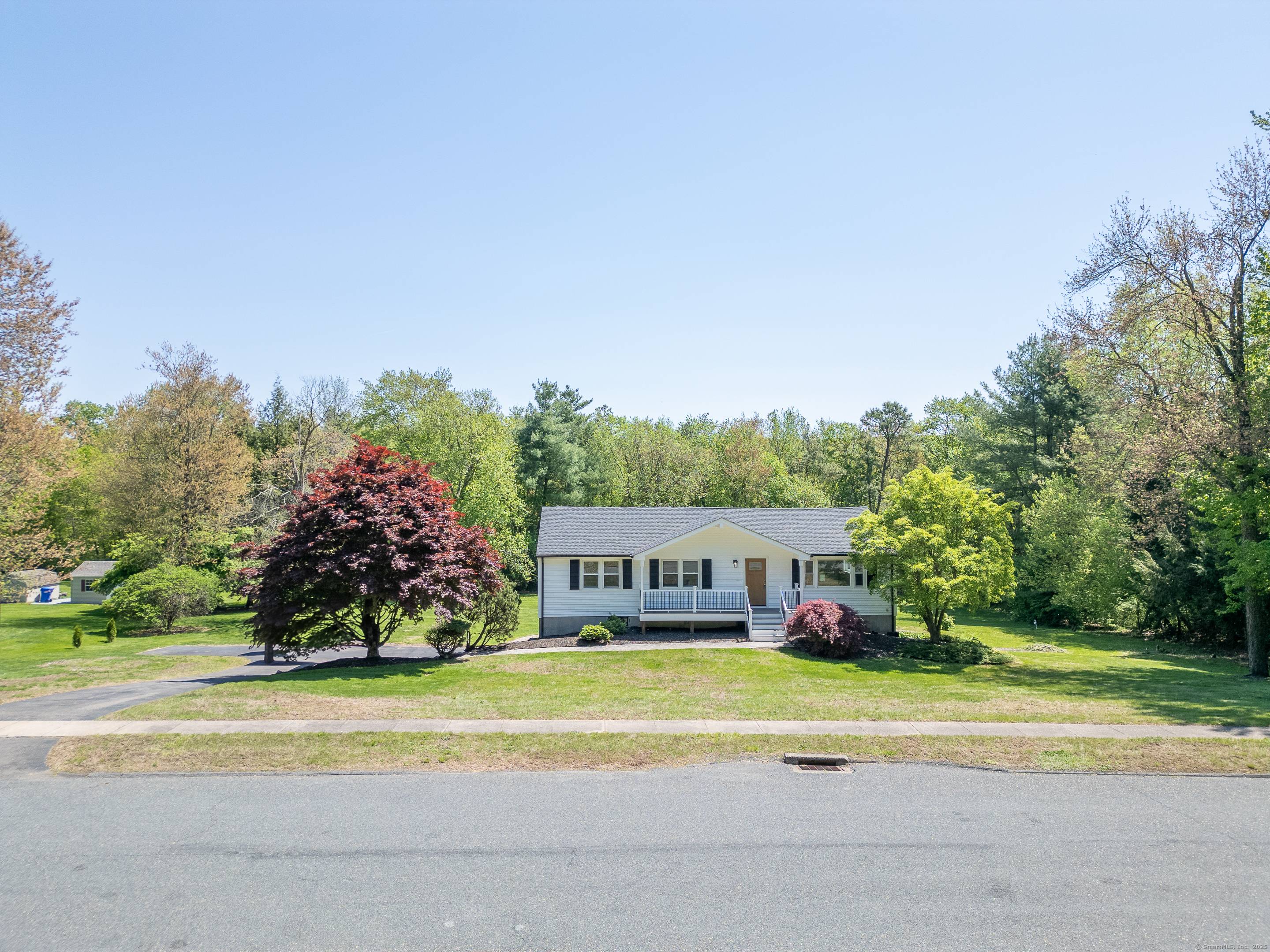 Welcome to 9 Punkin Dr, a beautifully renovated 3 bedroom, 3 bath raised ranch in Ellington, CT.