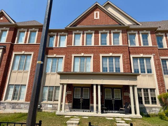 Luxury townhome in Bram West with double door entry, 9ft ceilings on 2nd floor, open concept staircase with iron railings, LED lighting amp ; double car garage.