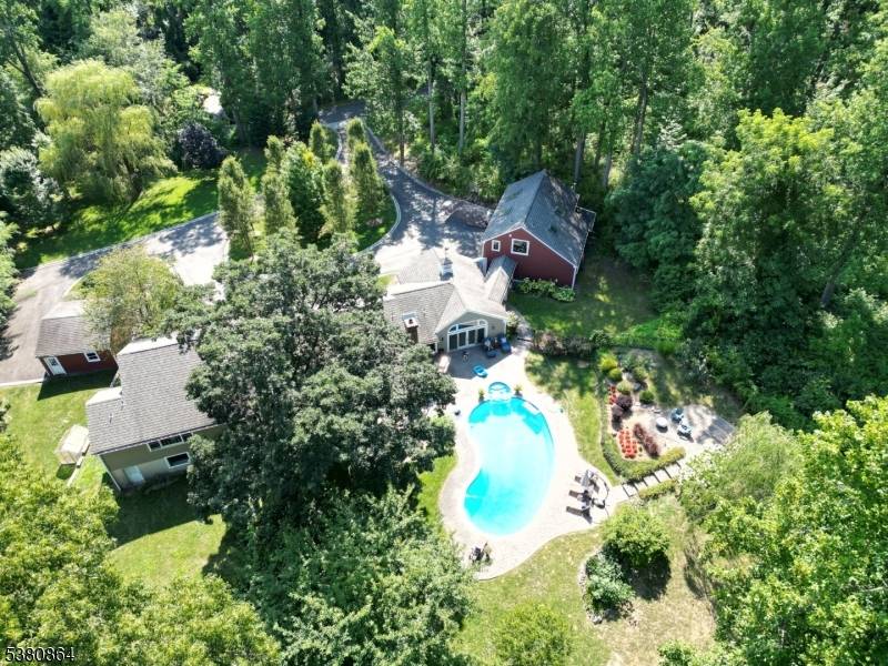 Welcome to this beautiful home located in picturesque Harding Township.