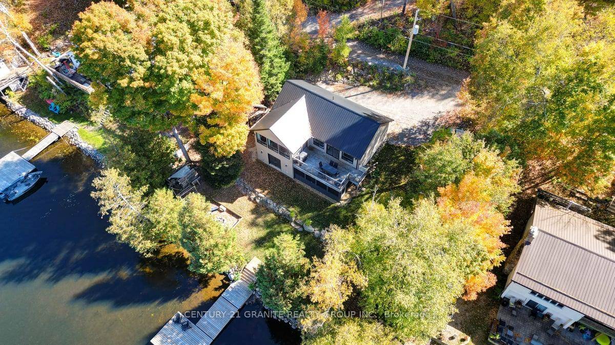 Escape to a beautifully well maintained, open concept waterfront Home nestled on a quiet cul de sac, offering a truly spectacular view of Baptiste Lake.