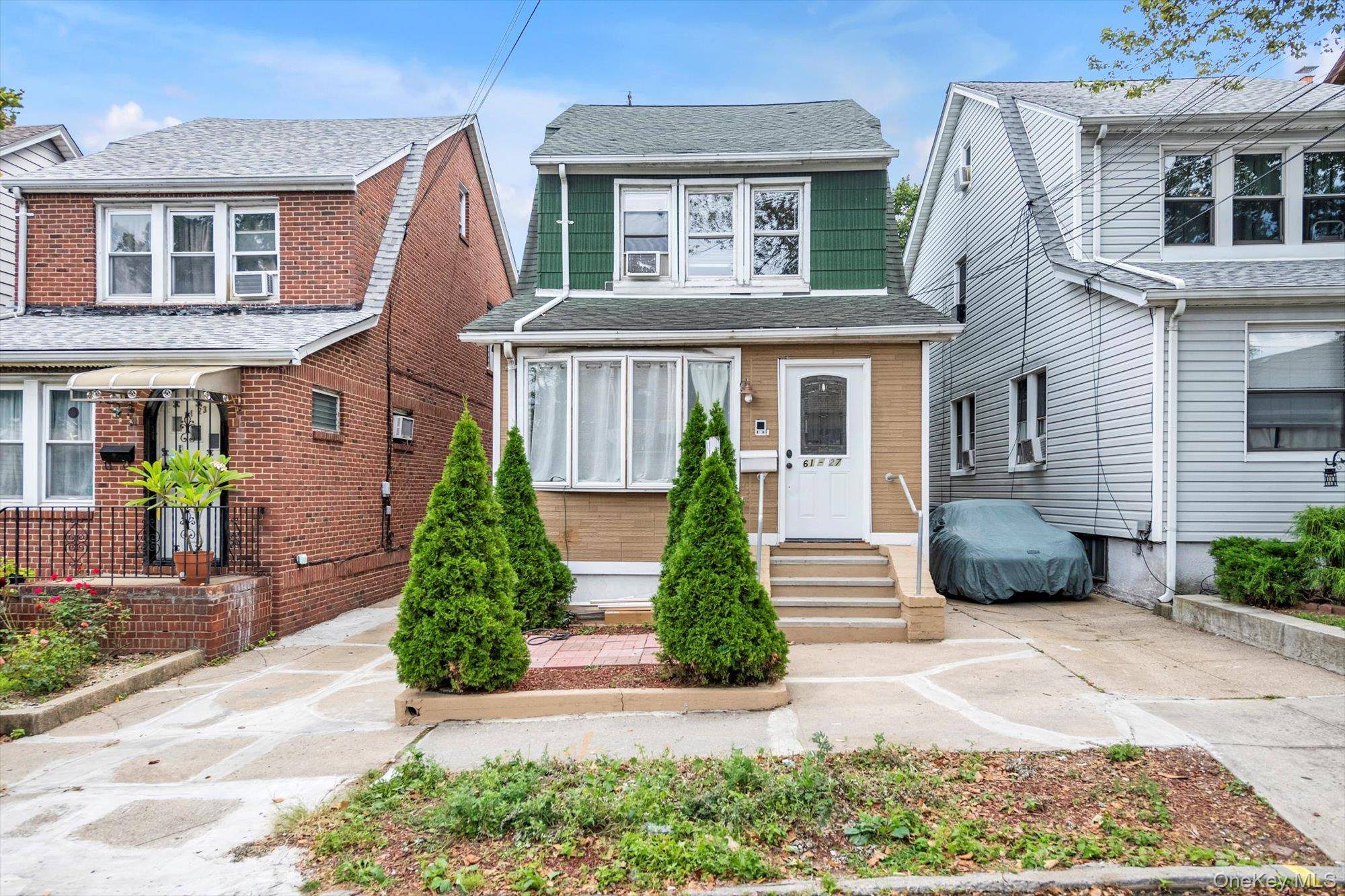 Detached 2 Family house on a great block in the Fresh Meadows.