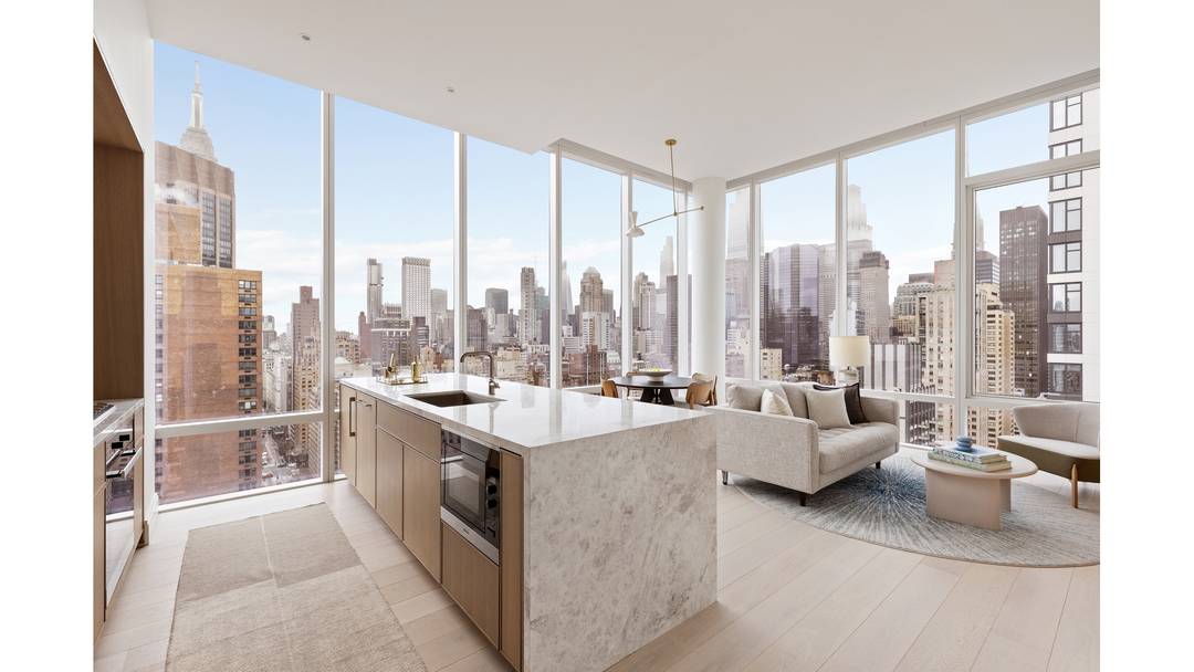 An Expansive Corner 2 Bedroom with a Sprawling Wrap Around Terrace, 14 Foot Ceilings amp ; Iconic City Views This rare corner 2 bedroom residence is defined by dramatic 14 ...