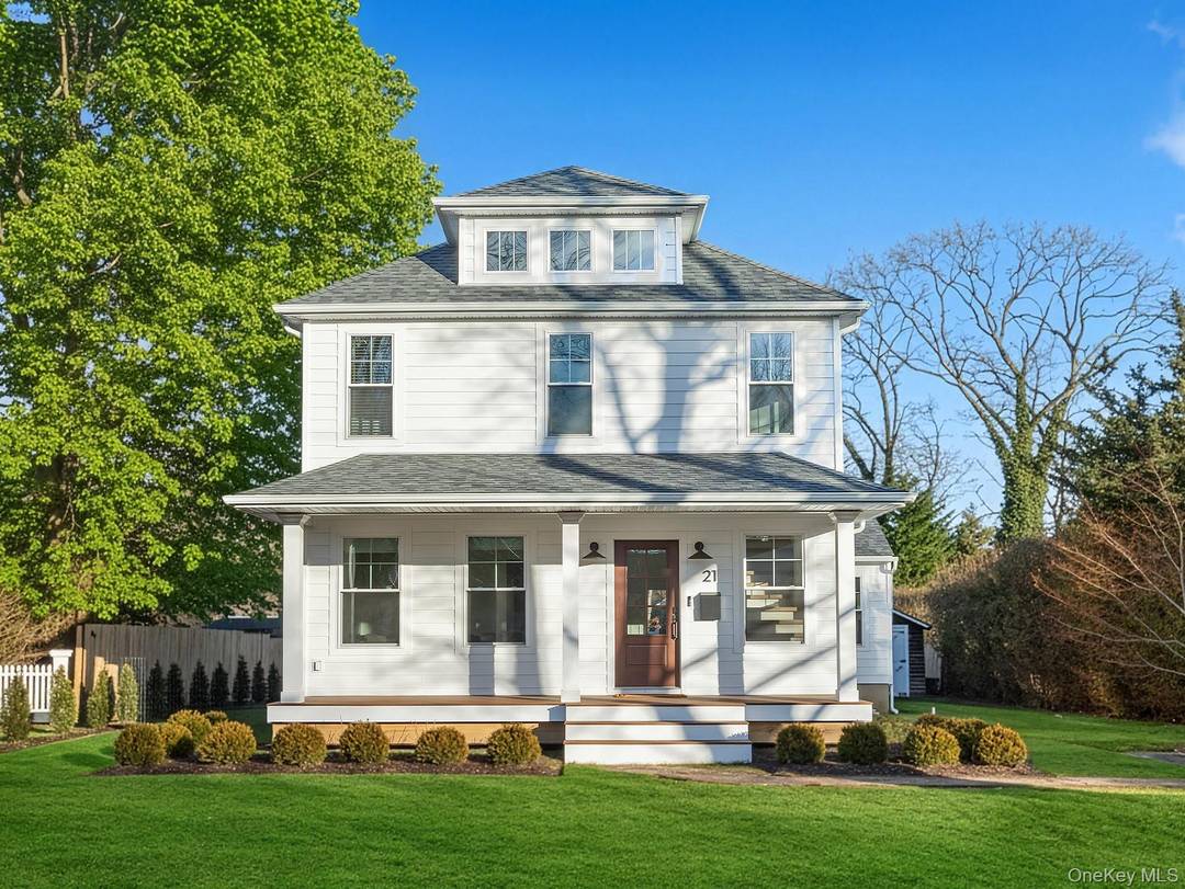 Welcome to this masterfully reimagined Bellport Village residence that blends crisp white exterior charm, classic village architecture, and a polished modern feel.