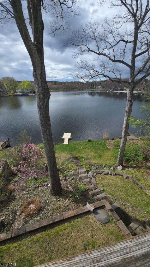 Escape to this charming lakefront chalet offering 2 bedrooms and 2 full baths, perfectly designed to create enduring memories, capture breathtaking water views and unforgettable sunsets.