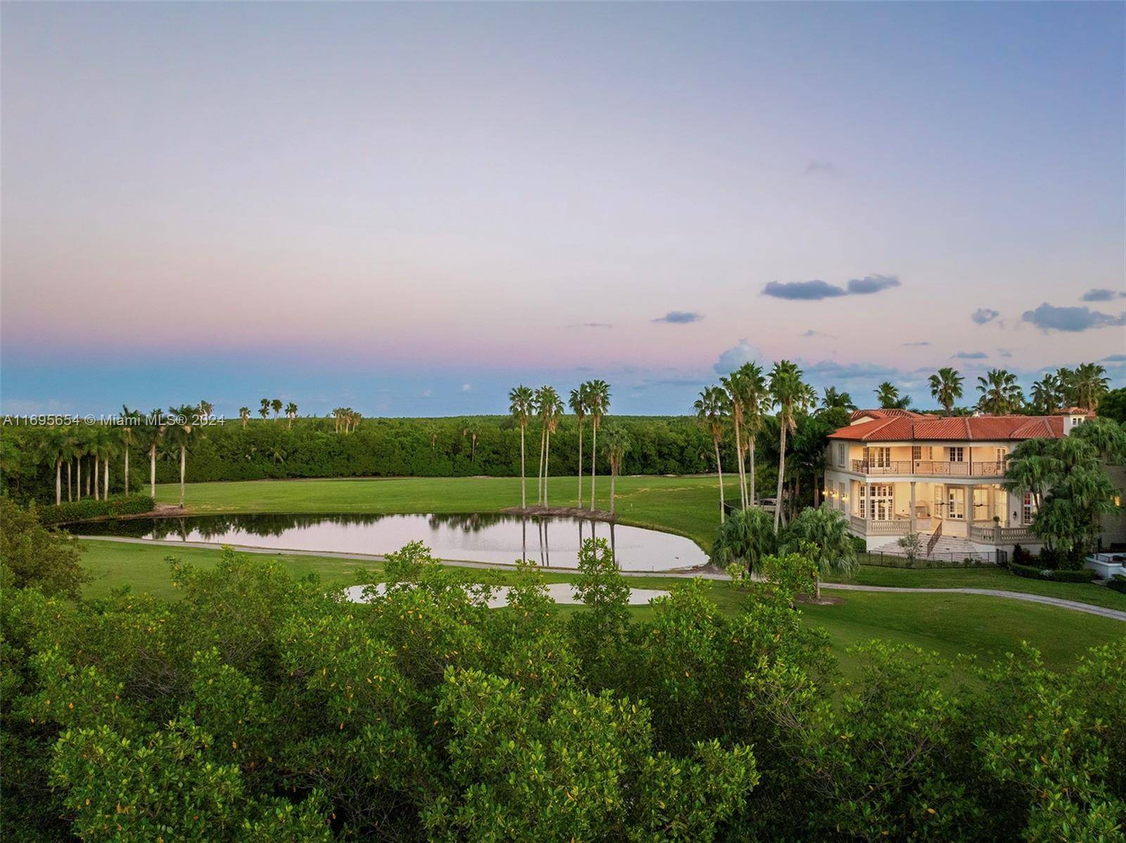 Nestled within the unparalleled security of Deering Bay Estates, this Mediterranean style estate stands as a radiant jewel in Coral Gables' most exclusive resort style community.