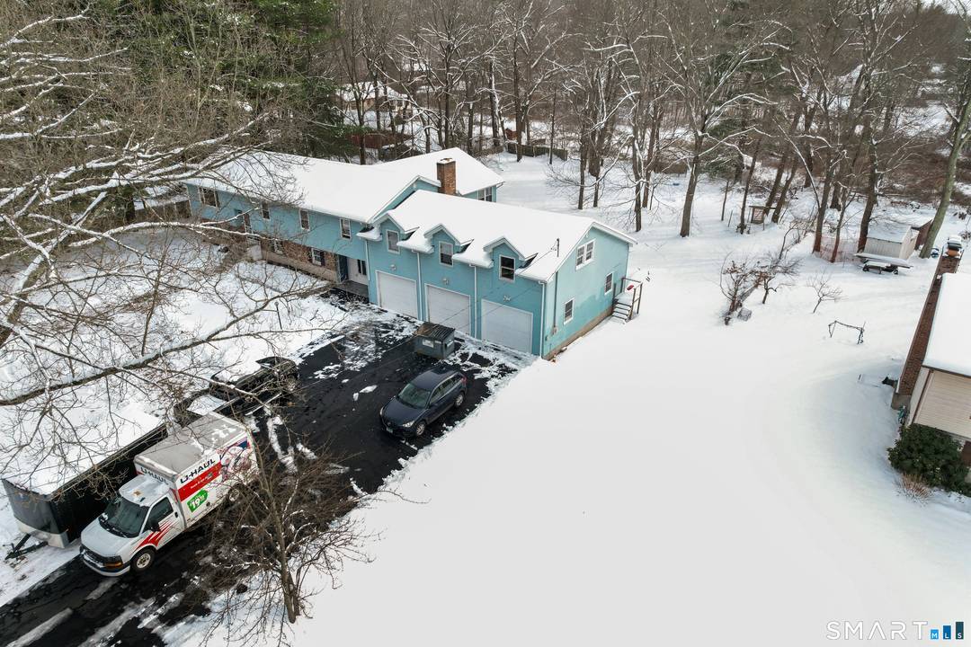 One of a kind ! ! ! Multi Generational home, with separate 1st floor in law, over 5000 sq ft of living area situated on nearly an acre level lot.