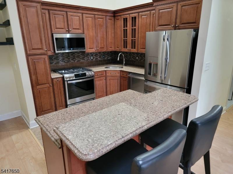 Discover the charm of this well kept second floor end unit, featuring 2 bedrooms and 2 full bathrooms.