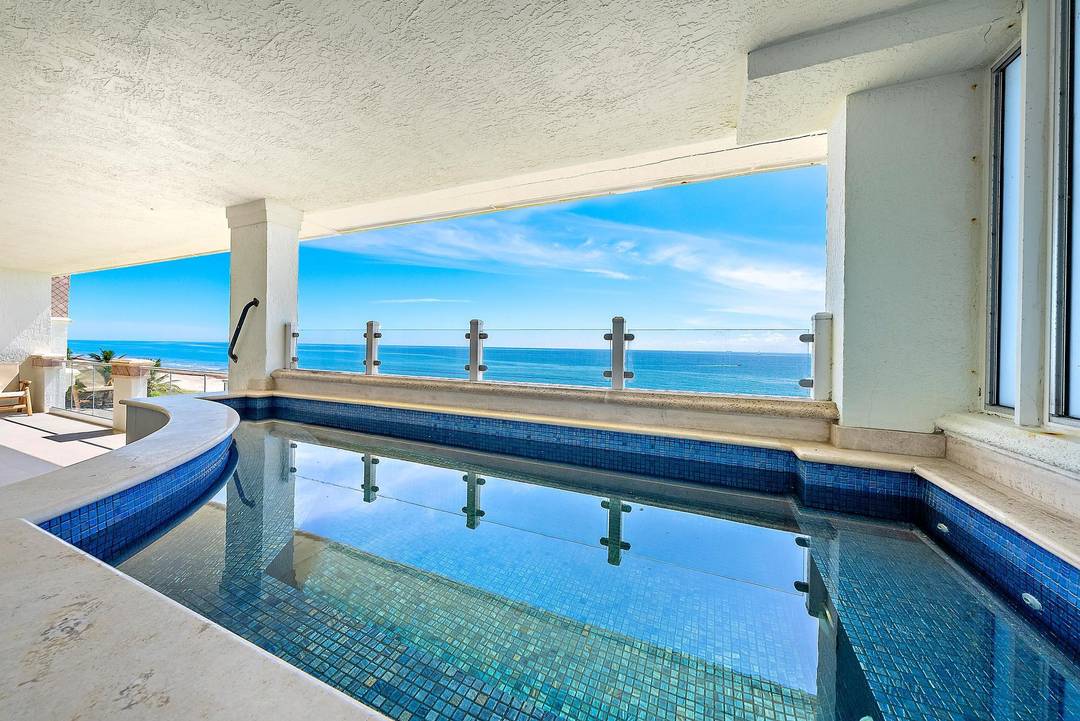 Private Penthouse Oasis with Sweeping Ocean Views Elevate your lifestyle in this exquisite fourth floor penthouse at the exclusive Athena, accessible by your own private entry and elevator.