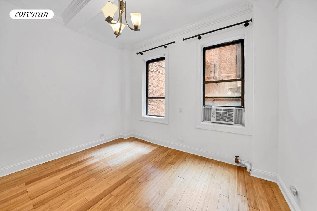Welcome to 120 West 58th Street, Unit 2C, a charming pre war condo nestled in the Central Park South area, right off glorious Central Park.