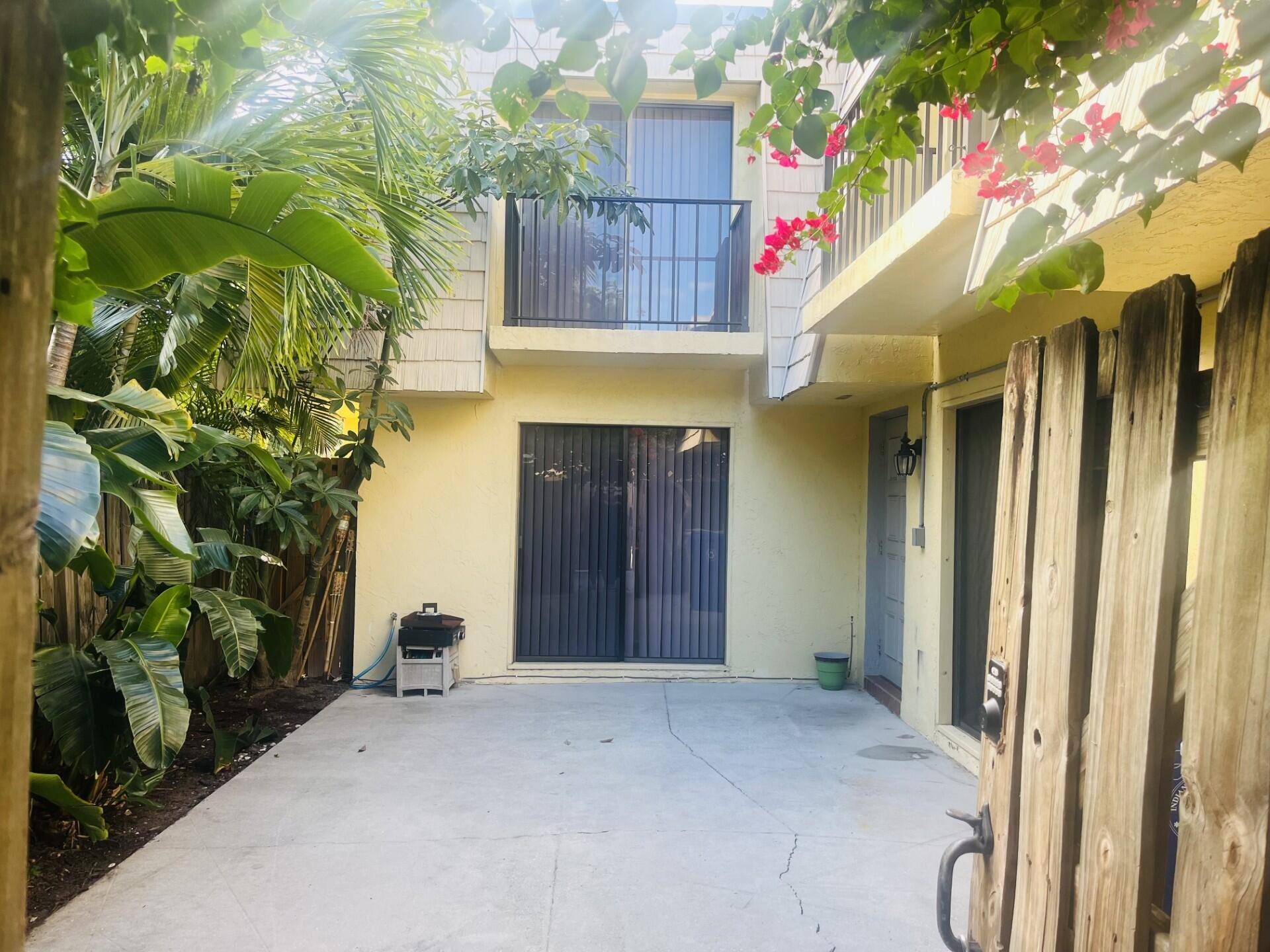 Best location at the back of the complex in Tropic Villas North with nearly 1, 200 sq.