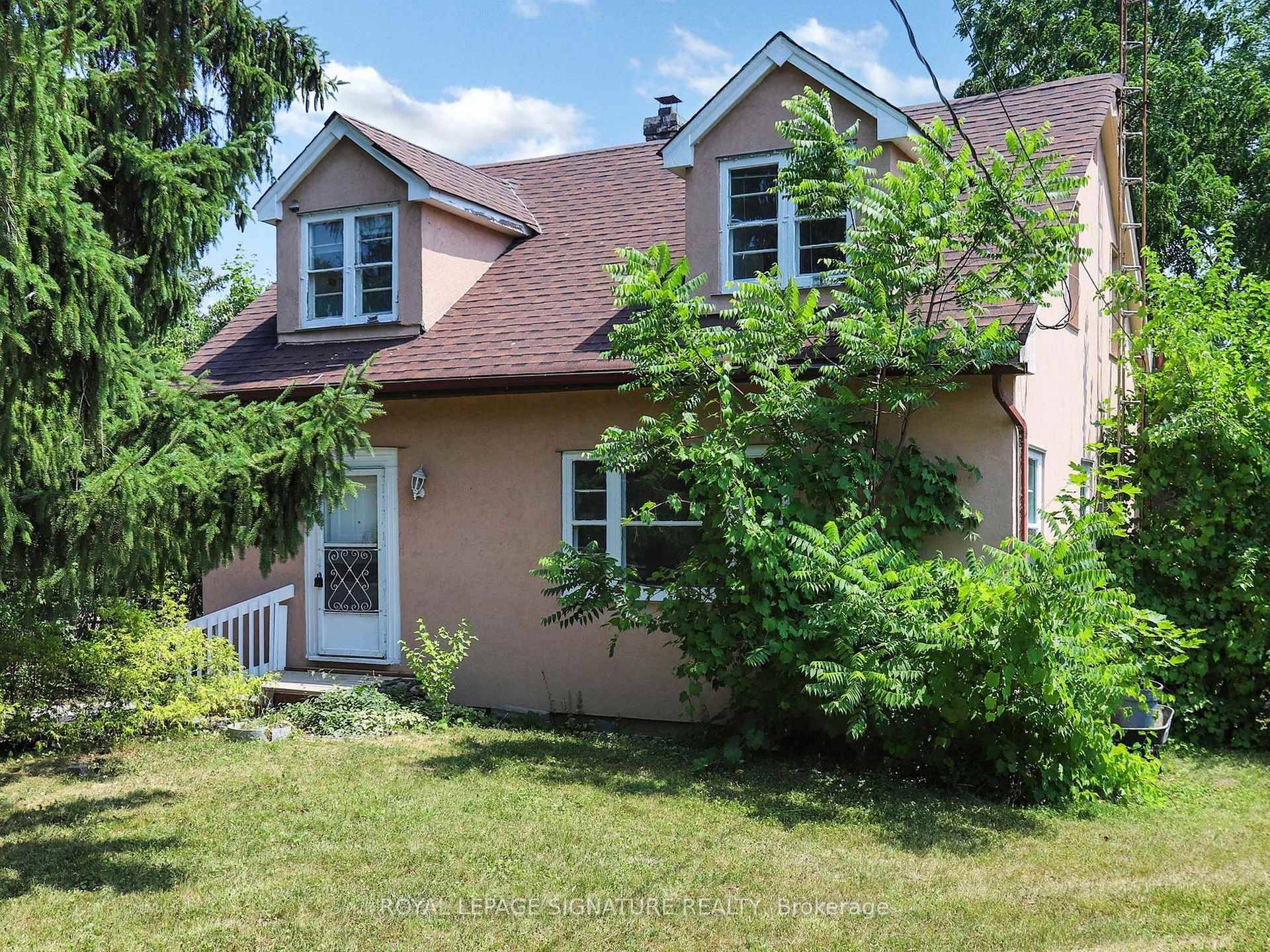 2 Bedroom with Ensuite Laundry in Prestigious South Richvale surrounded by Multi dollar Homes.
