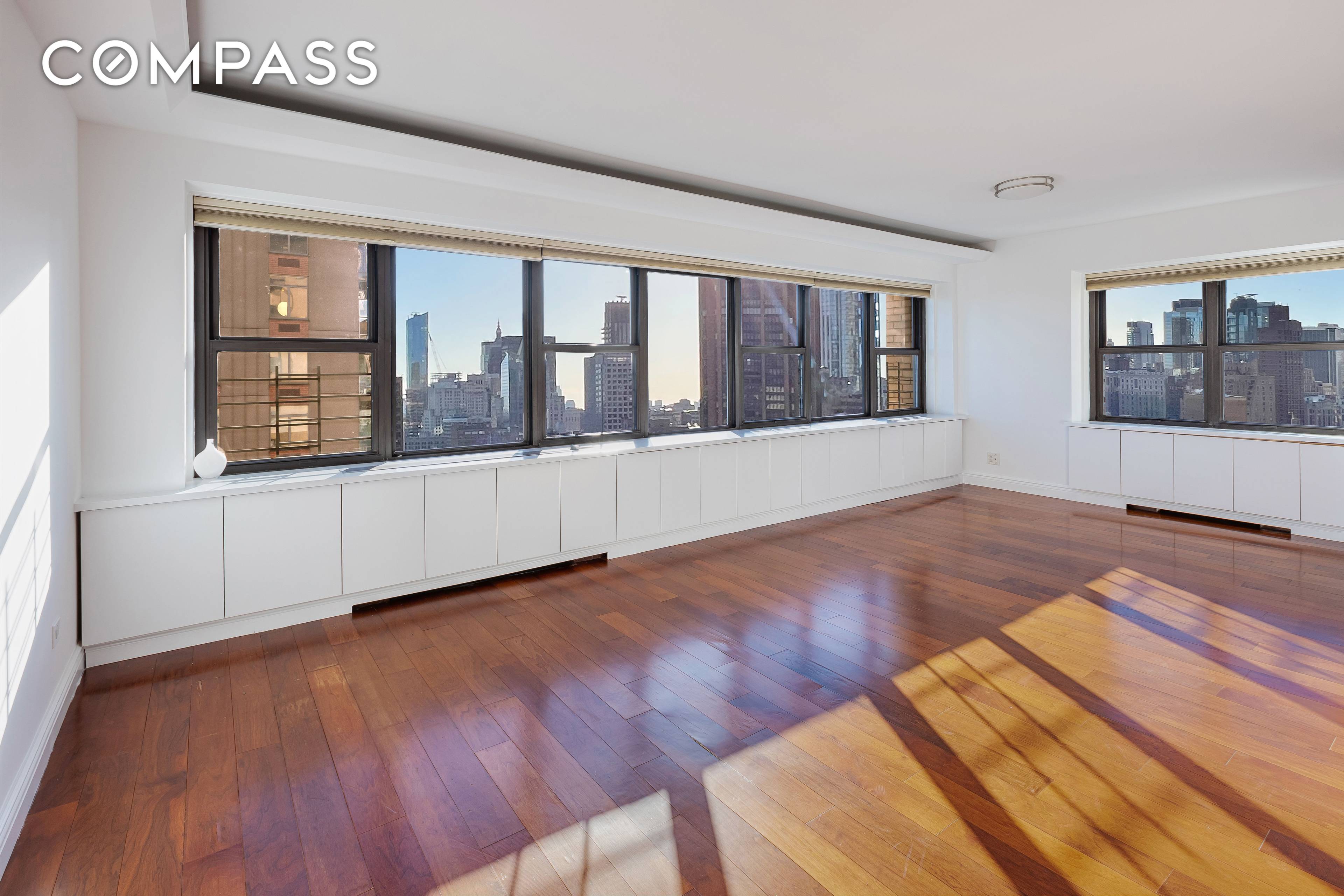Welcome to Residence 32A, a high floor, sun drenched corner 2 bedroom, 2.