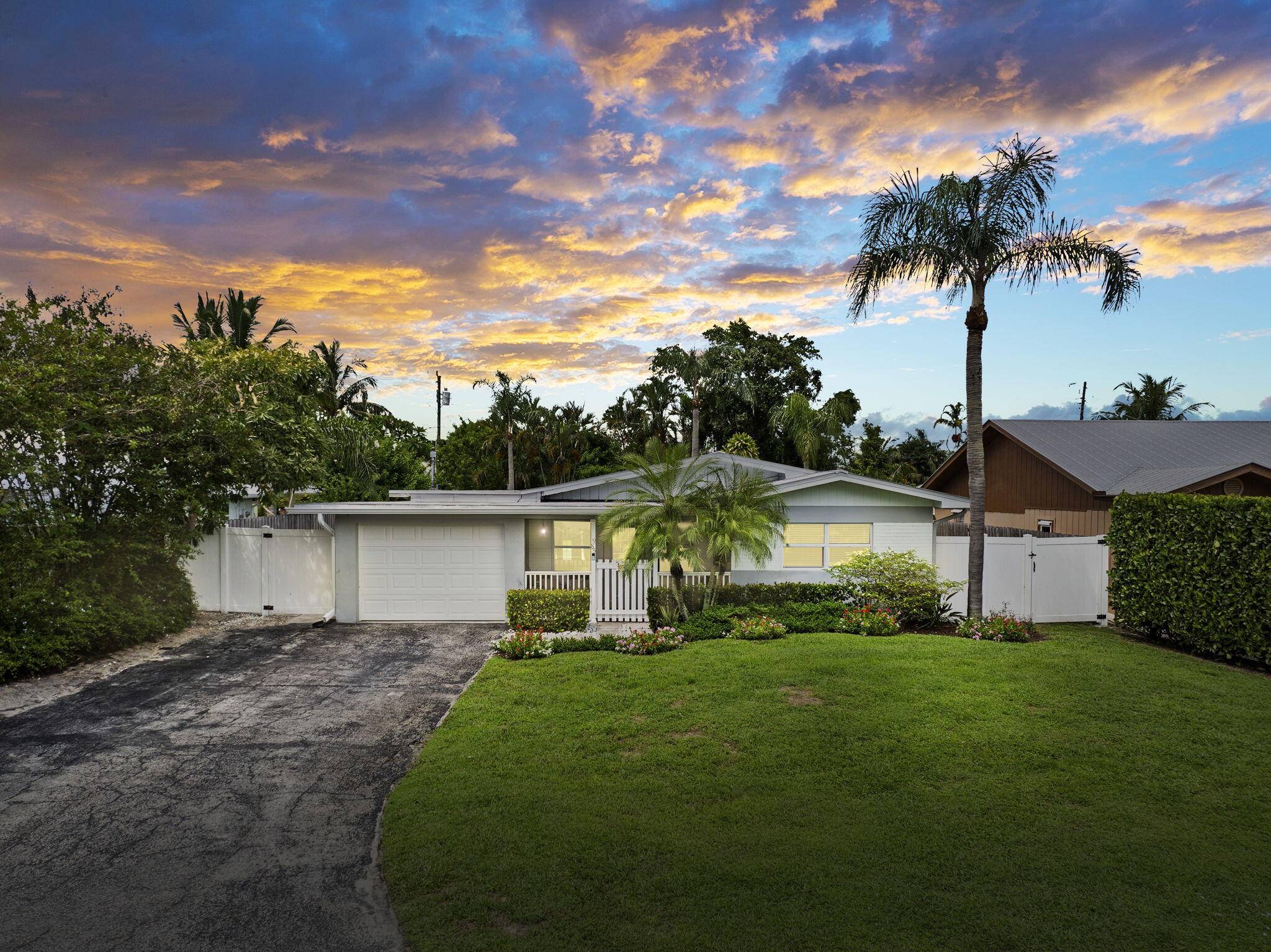 CLASSIC FLORIDA CHARM ! You must see this beautifully updated 3BR 2BA CBS POOL home in Palm City.