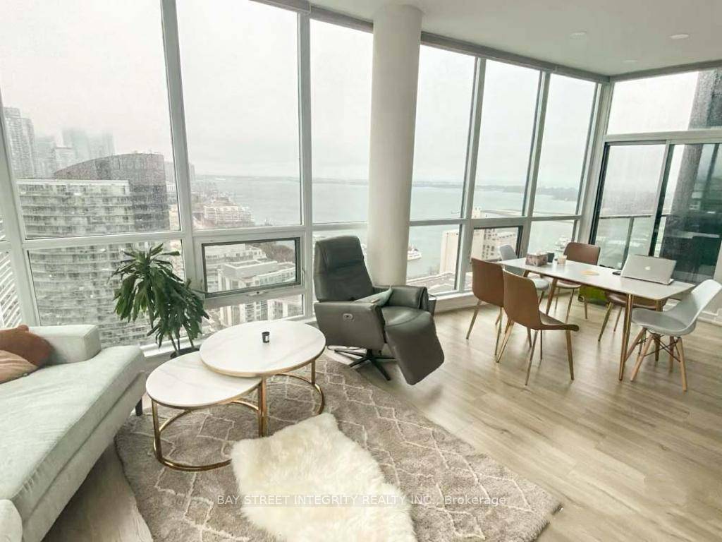 Unobstructed Lake And City View From The Stunning 2 Bedroom Upper Penthouse At Malibu.