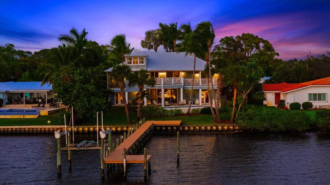 Stunning Waterfront Home with Southwest Exposure Welcome to your dream waterfront retreat !