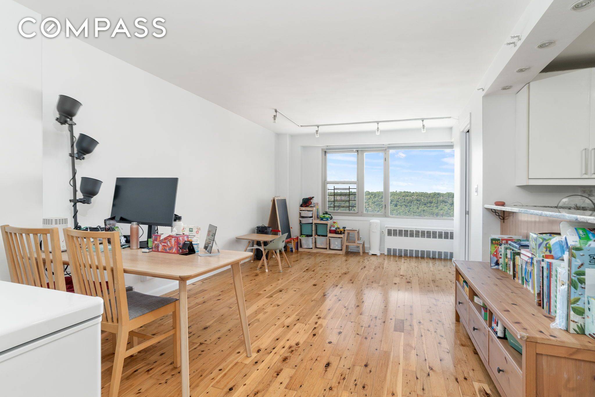 Welcome to this charming junior 4 Convertible 2 co op apartment located at 900 W 190th Street in the heart of Hudson Heights, Manhattan.