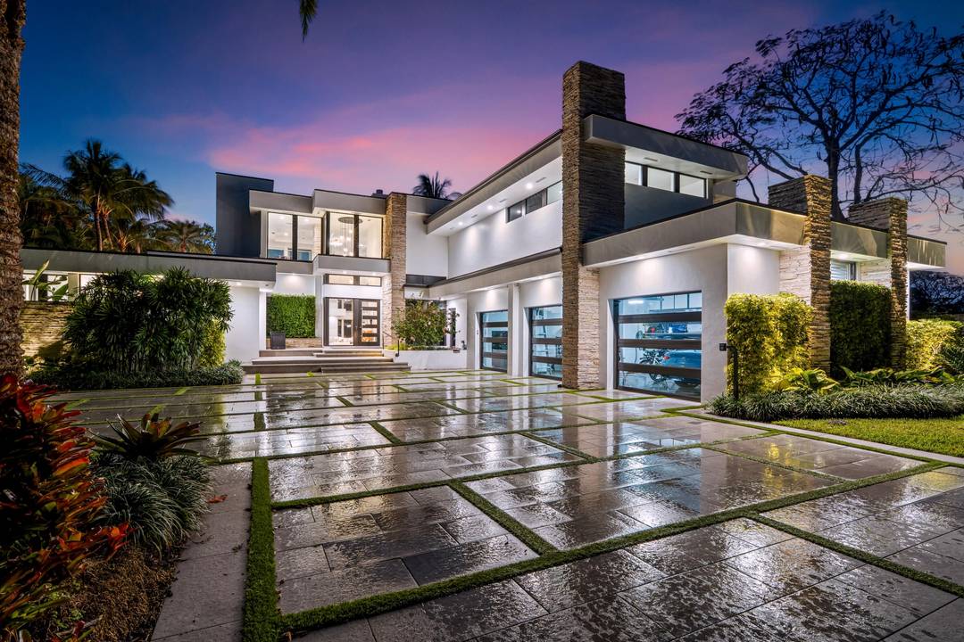 On nearly one acre with 110 feet of direct frontage on Lake Ida, this rare architectural statement estate, inspired by the timeless design philosophy of Frank Lloyd Wright, blends natural ...