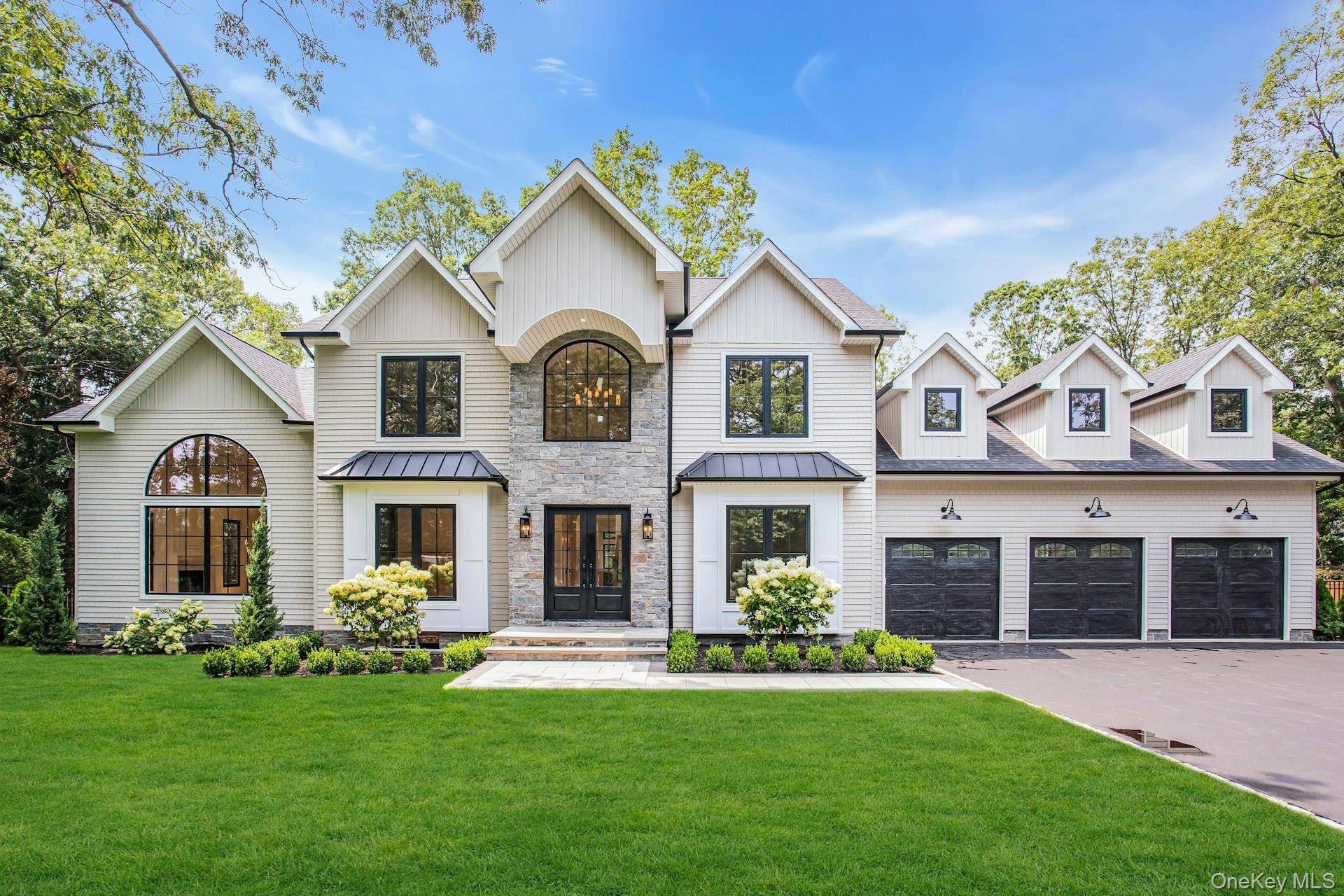 Welcome to 115 Weeks Drive, a builder s own custom estate in Dix Hills.