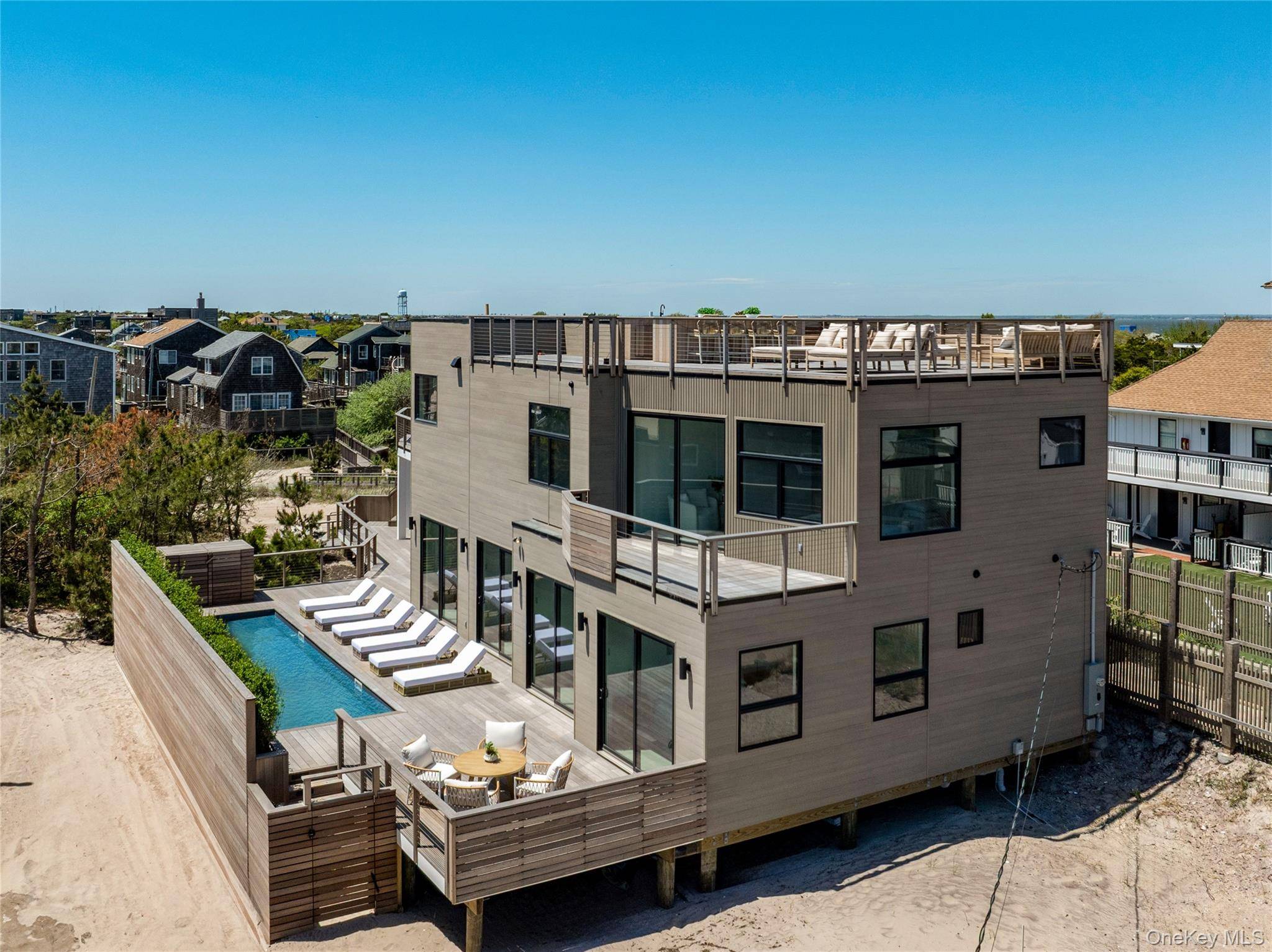 Stunning Ocean View 5 BR New Construction With Pool amp ; Gym Situated on an ocean view double lot, one house back from the beach, this ground up new construction ...