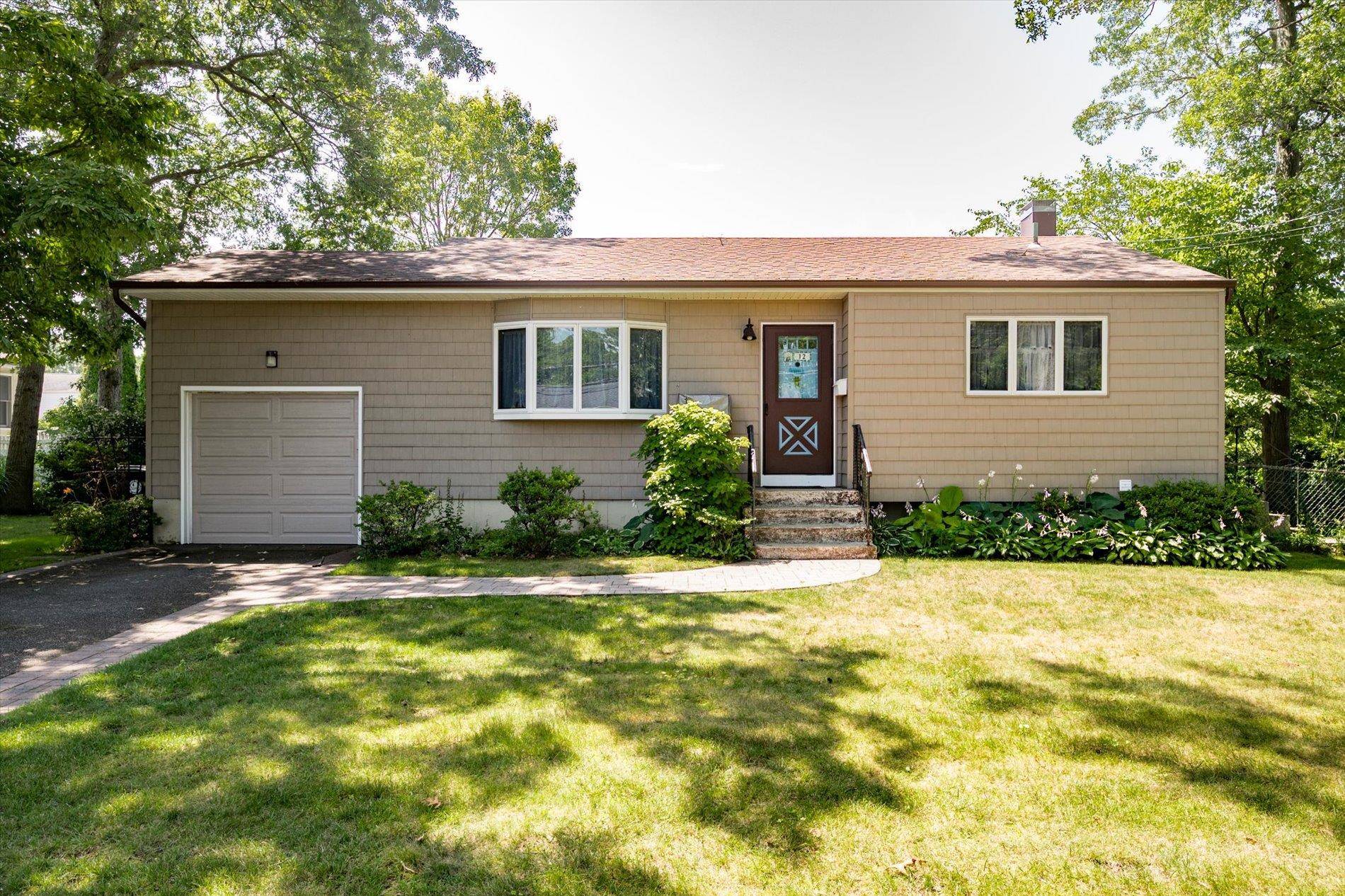 Welcome to this beautifully updated 3 bedroom, 1 bath ranch nestled in one of Islip s most desirable neighborhoods.