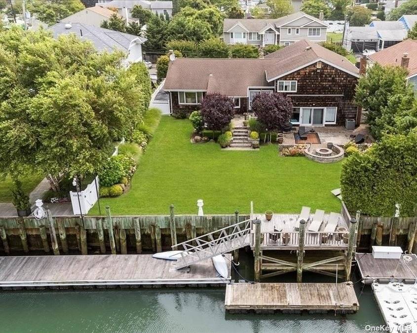 WATERFRONT Pristine, generously sized home offering stunning BAY VIEWS !