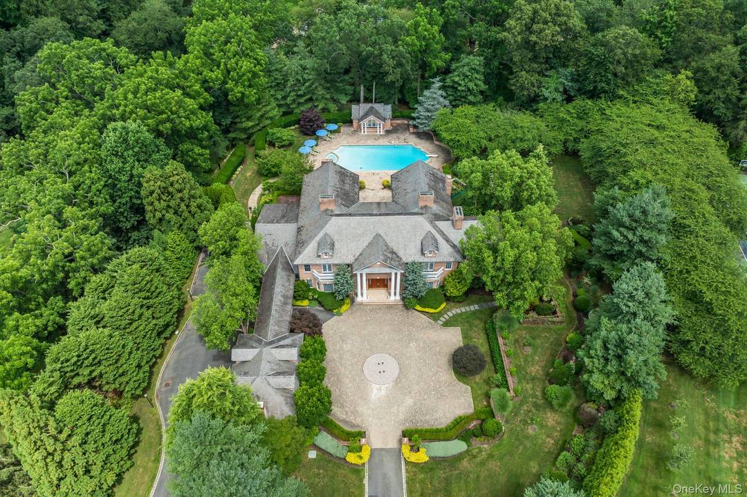 Nestled on 5. 33 acres of pristine landscape, this stunning 2003 estate embodies sophisticated living at its finest.
