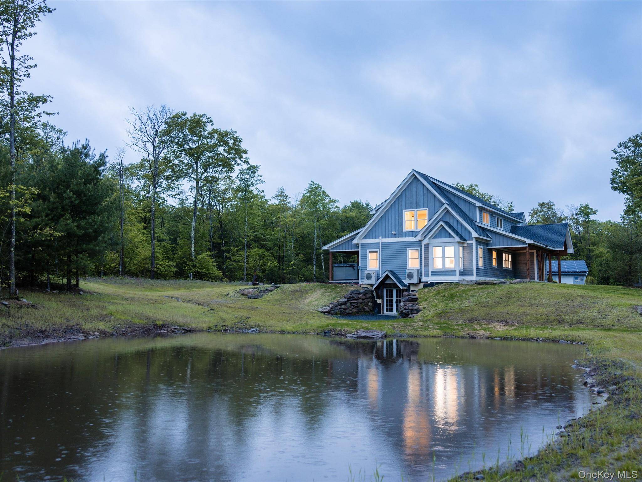 Nestled in the heart of Forestburgh, in the Foothills of the Catskills, this recently completed, stunning 5 bedroom, 4.