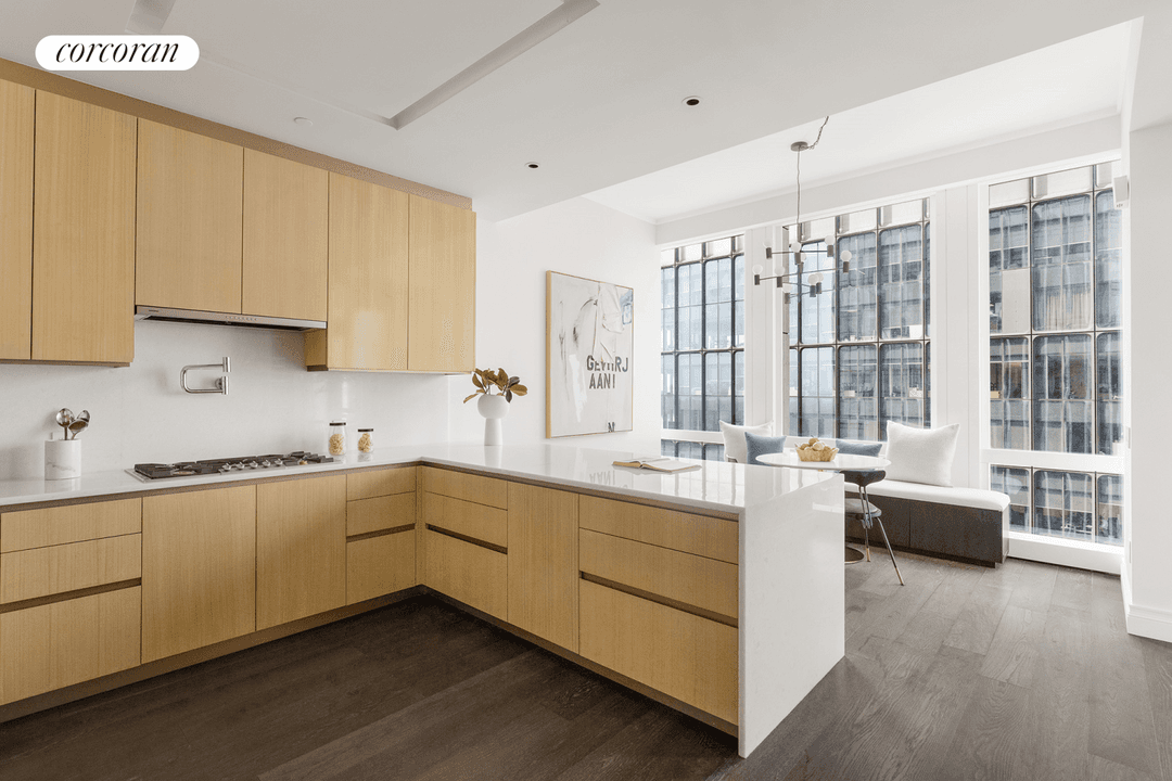 YOUR OPPORTUNITY TO PURCHASE THIS GRACIOUS CORNER THREE BEDROOM HOME !