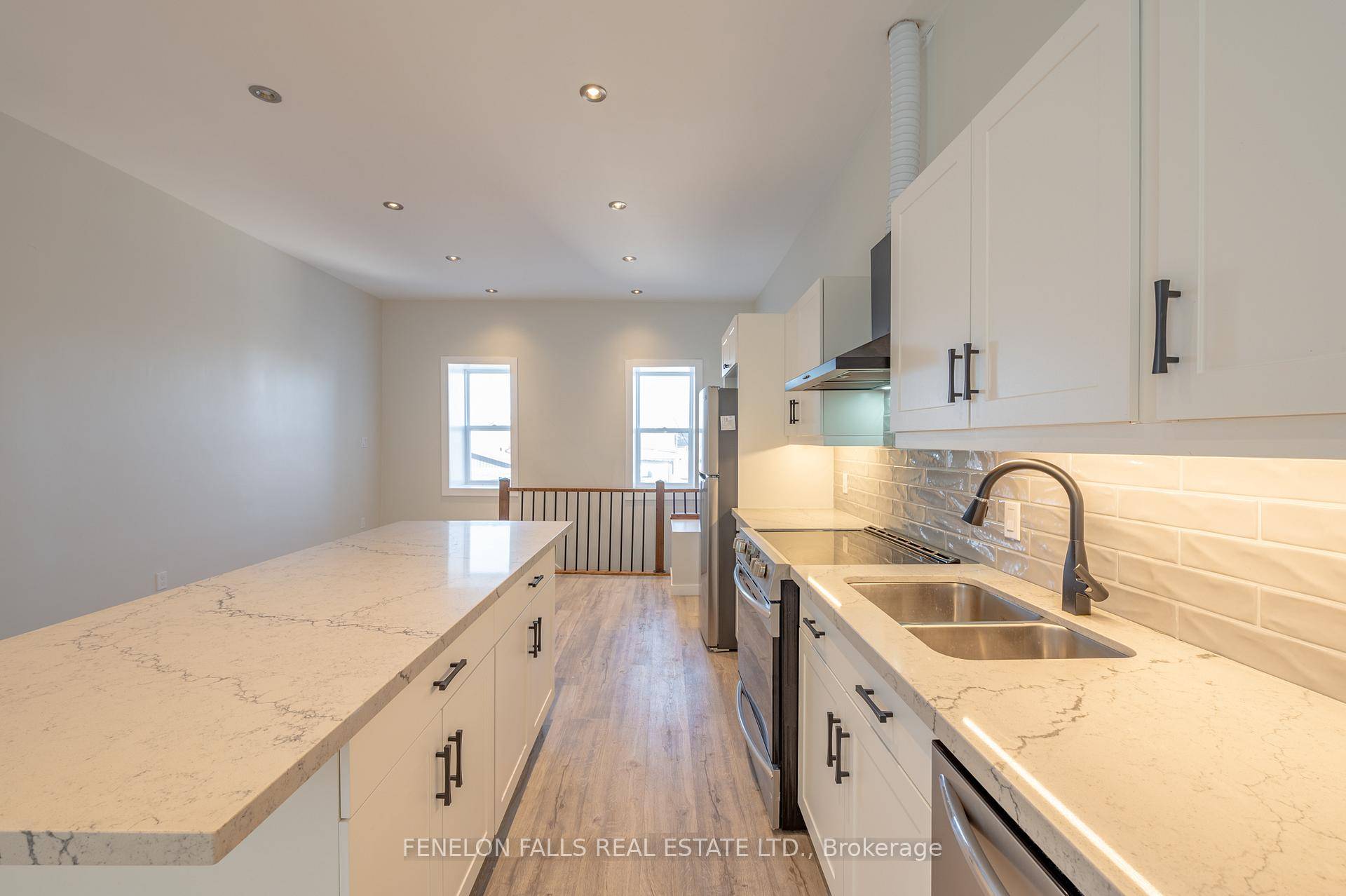 This stunning second floor apartment located on the bustling main street in downtown Fenelon Falls offers a spacious and well lit one bedroom plus office layout.