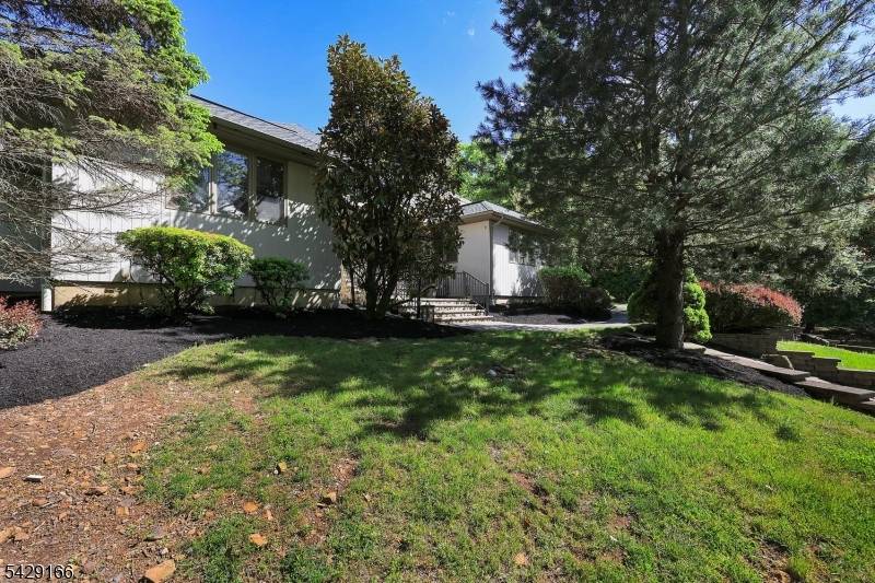 Tucked away on a peaceful cul de sac surrounded by natural beauty, this custom built home offers exceptional space, comfort thoughtful updates throughout.