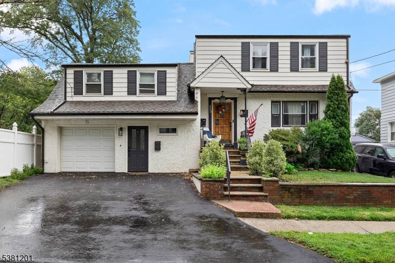 What a unique duplex style home, and just half a mile from the Linden train station, DIRECT TO NYC.