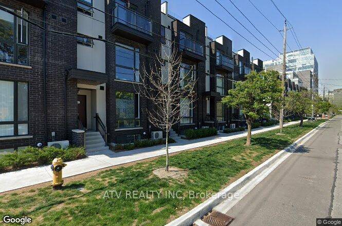 Two Story Stacked Condo Townhouse Facing Quiet Residential Neighborhood.