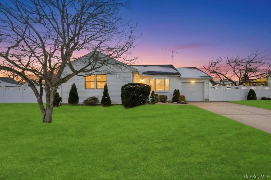 Charming ranch style home offering three bedrooms and two full bathrooms.