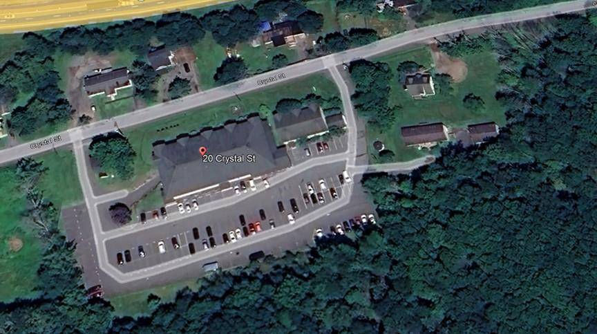 Property consist of a large Office building with a large parking lot and three multi family homes with 6 rental units.