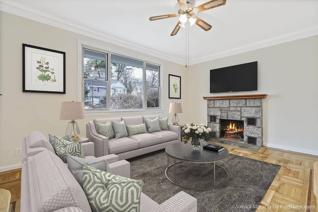 This charming three bedroom, three bathroom ranch is situated on a tranquil street in Ardsley.