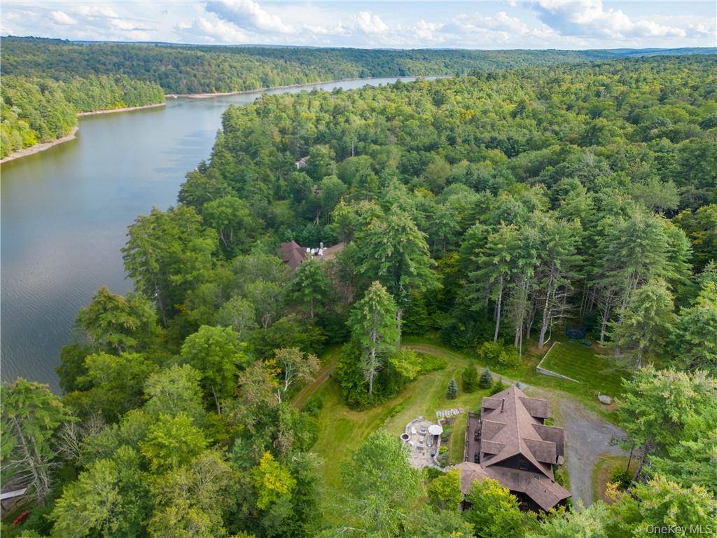 This custom Adirondack Lake Home is loftily placed on a majestic 5.
