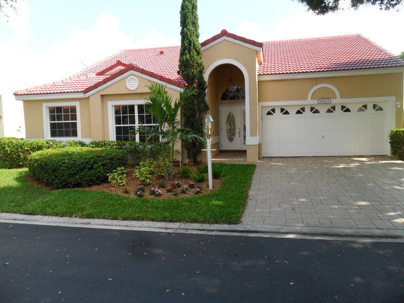 Nicely updated 4 bedroom 2, 5 bath single story home in Siena Oaks in Palm Beach Gardens.