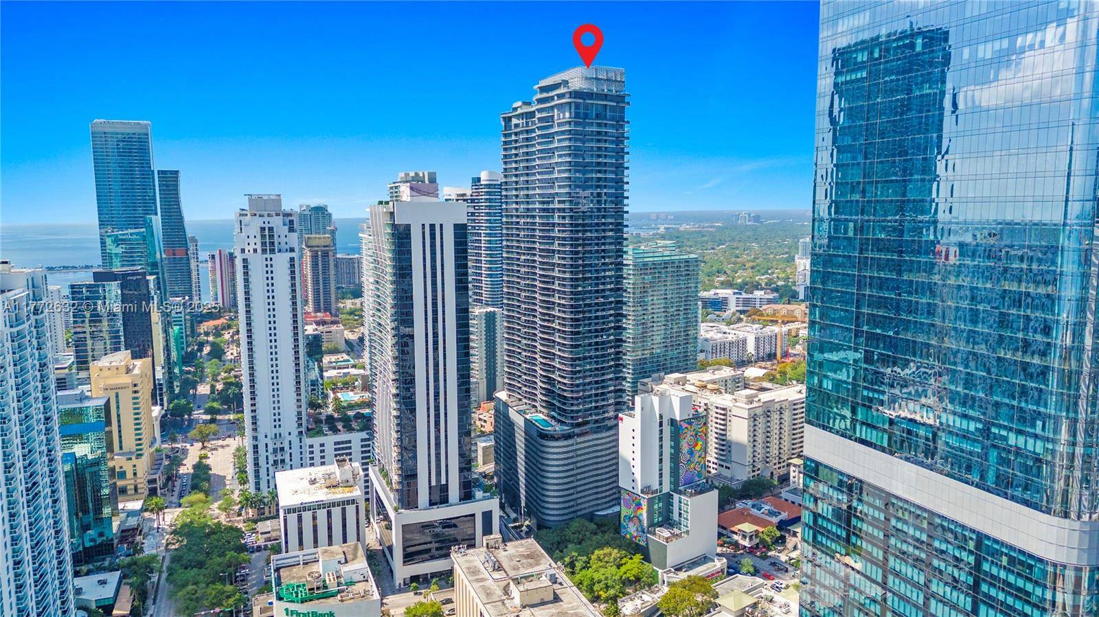 Experience stunning panoramic views of the Brickell skyline and Biscayne Bay from this elegant 1BD, 1.
