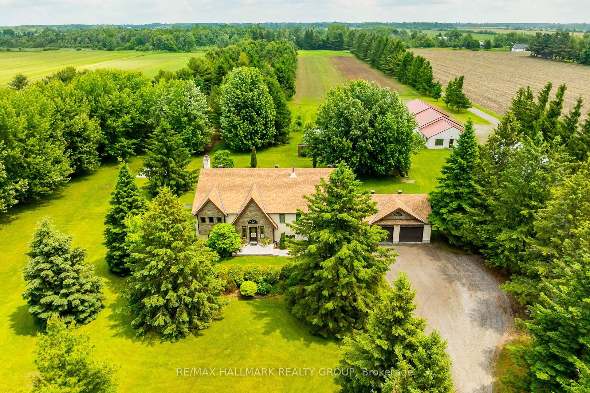 Nestled on approximately 24 acres of mature, treed landscape, this stunning custom built 3 bedroom home offers the perfect balance of comfort, space, and opportunity.
