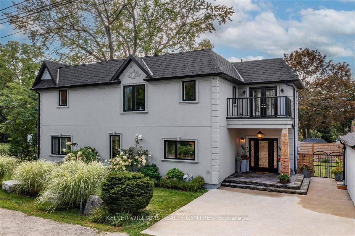 Pristine, one of a kind Custom Contemporary home built in 2021 is located in the Historical Lakeside Community of Orchard Beach and just steps to Lake Simcoe.