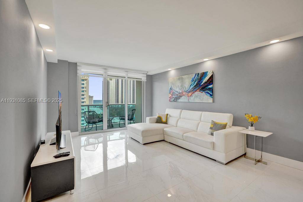 Fully remodeled, bright, modern, and spacious residence offering breathtaking ocean, intracoastal, and open city views.