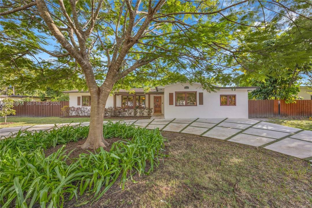 This beautifully renovated four bedroom, four bath South Miami home offers the perfect blend of space, style, and convenience.