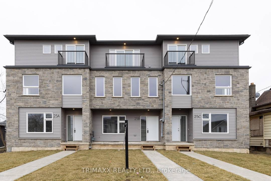 Modern Freehold Townhome with Dual Income Potential !