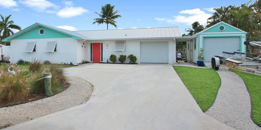 NOW'S your chance to own this COZY WATERFRONT PARADISE !