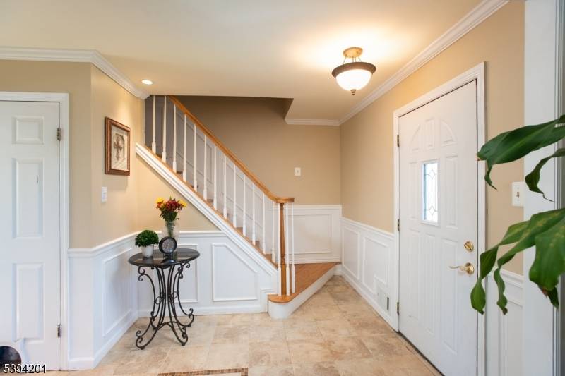 Welcome to this Kingsbridge model colonial style home in the sought after Woodfield Estates of Hillsborough Township.