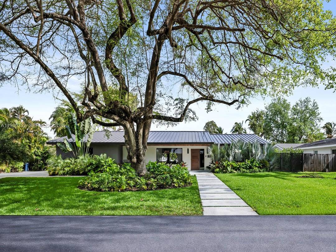 Fully reimagined modern residence on a rare canal front lot in prime N.