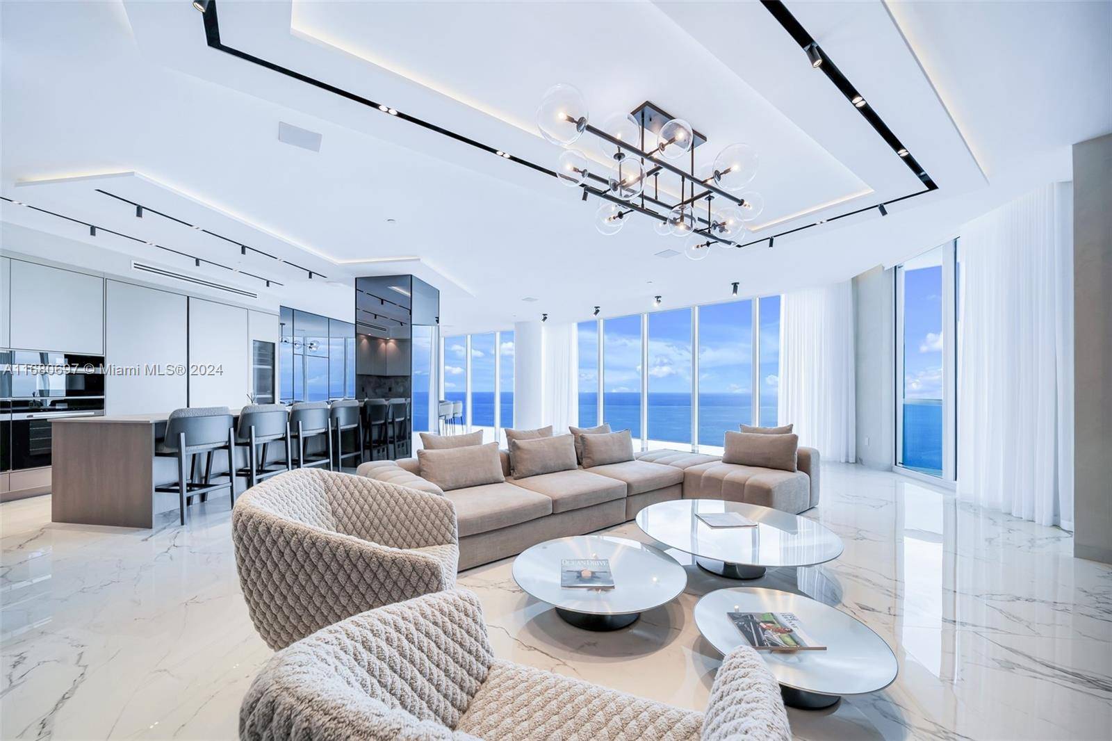 Experience Unparalleled Luxury amp ; Sophistication at this Turn Key SKY VILLA with 180 degrees of Panoramic Direct Atlantic Ocean, Intracoastal amp ; Miami Skyline Views !