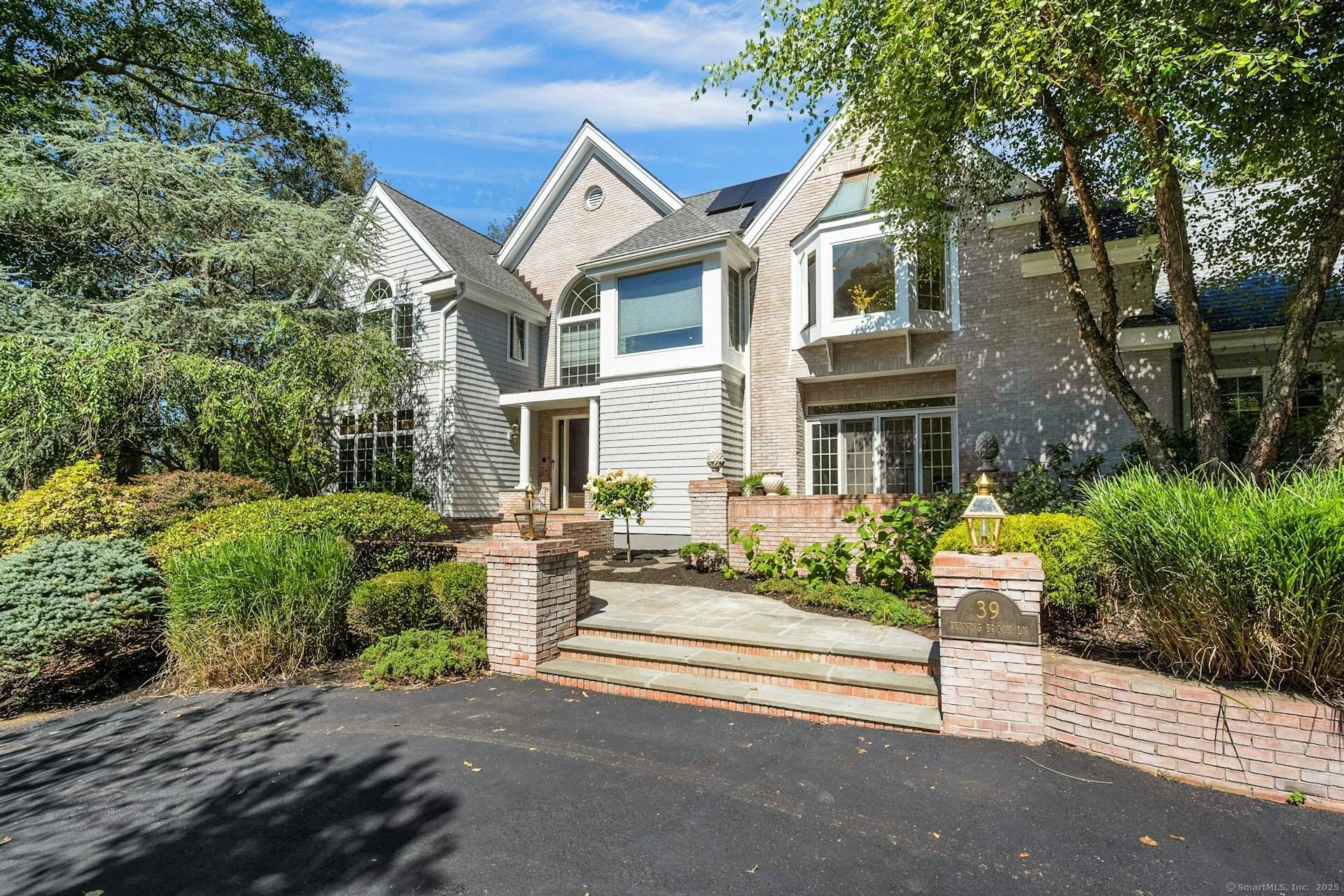 Welcome to 39 Running Brook Lane, an exceptional custom built home set on 2.