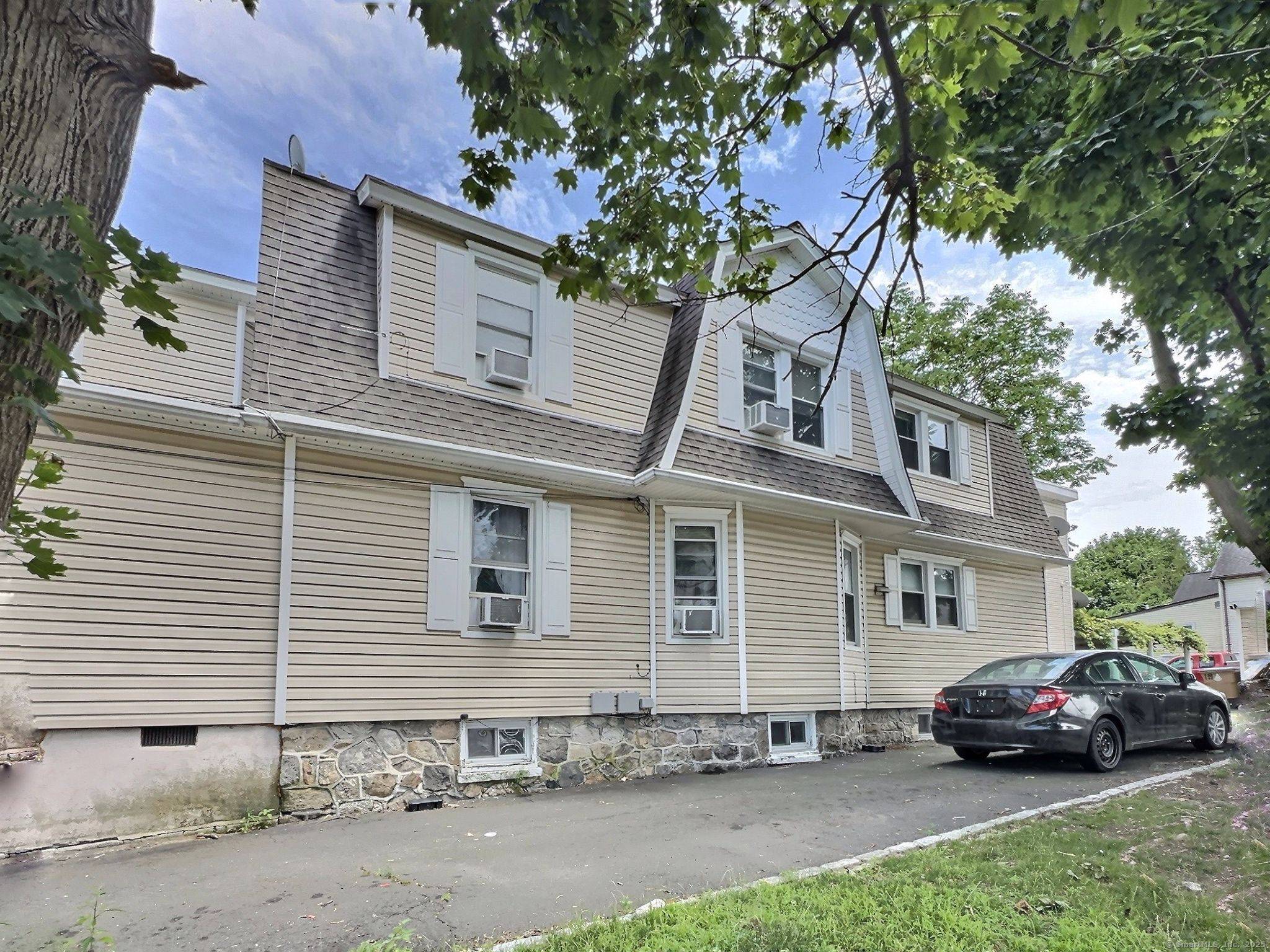 Charming Legal Three Family Home in Stamford, CT Welcome to 19 Woodrow Street, a well maintained three family residence situated in a desirable Stamford neighborhood.