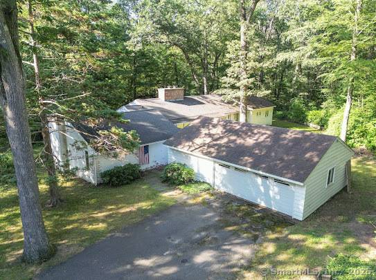 Sprawling 4 bedroom, 2. 5 bath Mid Century Ranch in desirable South Glastonbury, offering approx.